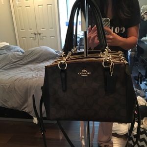 Coach Bag can be worn as a satchel or crossbody.